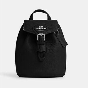 Coach Mini Backpack includes a Coach Wallet